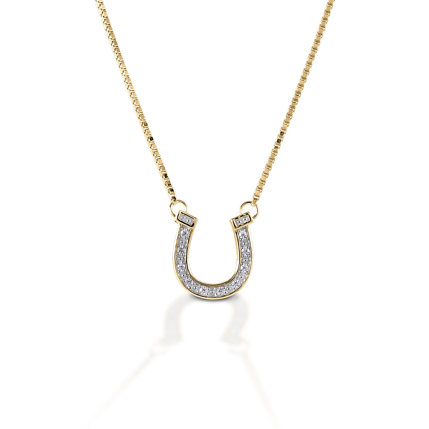 The Kelly Herd Pavé Horseshoe Necklace features an authentically detailed horseshoe pendant (it even has heel caulks!). The groove of the shoe is enhanced with pavé diamonds. Available in 14K gold. Features Horseshoe pendant Pavé diamonds Available in 14K gold 15mm x 16mm