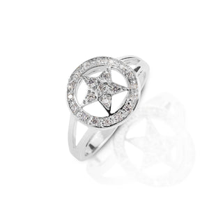 Show the world you're a star! The Kelly Herd Small Star Ring features a pave set diamonds star in a circle. Made of your choice of white or yellow gold, the open branching on the band keep this ring from looking bulky. A great gift idea for the star in your life!  Features      Western star themed ring     Diamonds     Available in white, or yellow 14k gold     Matching earrings, necklace, and bracelet available     13mm wide