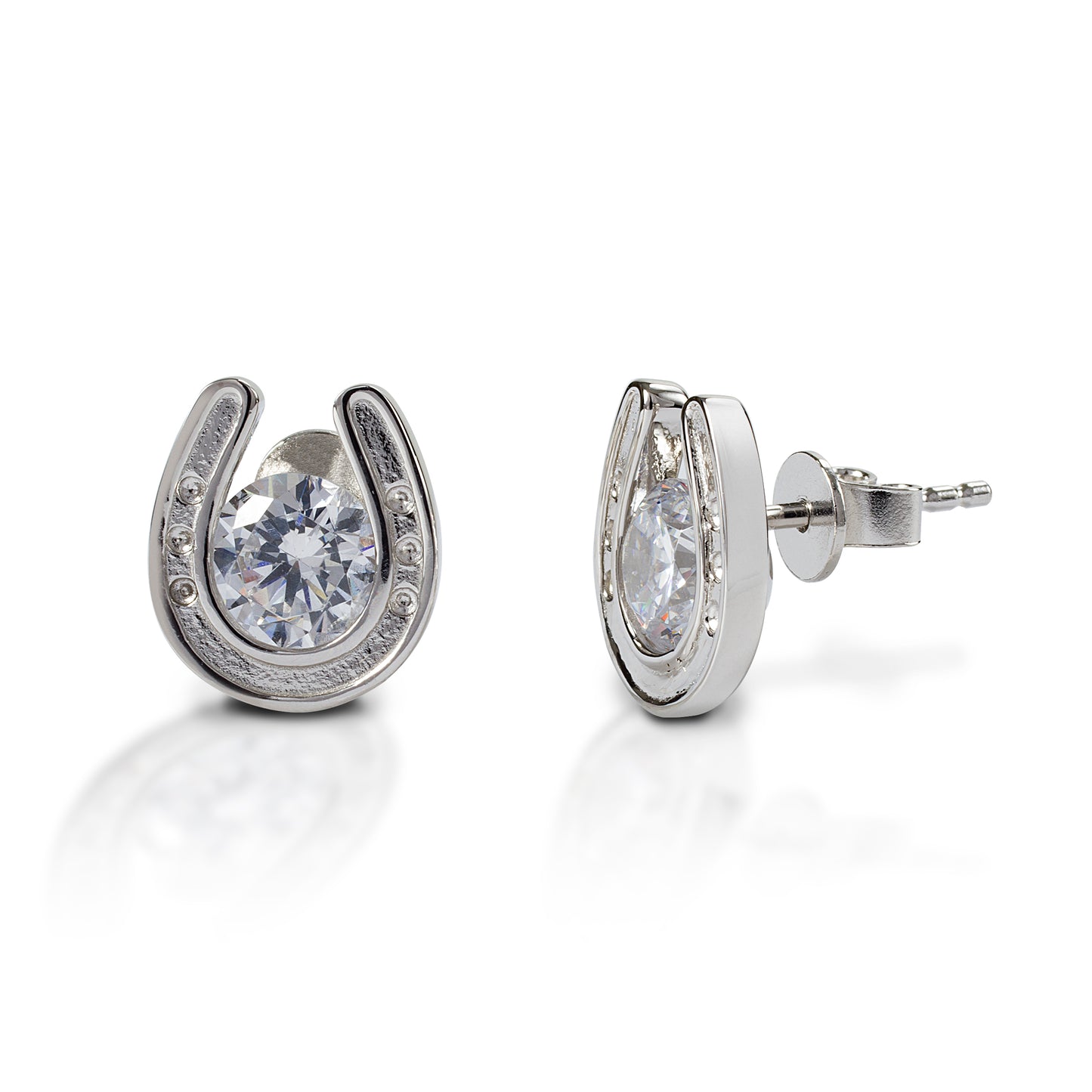 Stud earrings for horse lovers! Kelly Herd Horseshoe Stud Earrings feature diamonds surrounded by white or yellow gold horseshoes. The horseshoes are so detailed you can see tiny little nails! Features Horseshoe earrings White or yellow gold with diamonds Stud backs 12mm x8mm