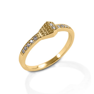 Dress up the horseshoe nail ring with pavé diamonds! Kelly Herd's Pavé Horseshoe Nail Ring adds some sparkle to this classic style. Made in your choice of white or yellow gold, it is set with pavé diamonds to reflect the light.  Features      Horseshoe nail ring     Pavé set with diamonds     Available in white, or yellow 14k gold     7mm wide