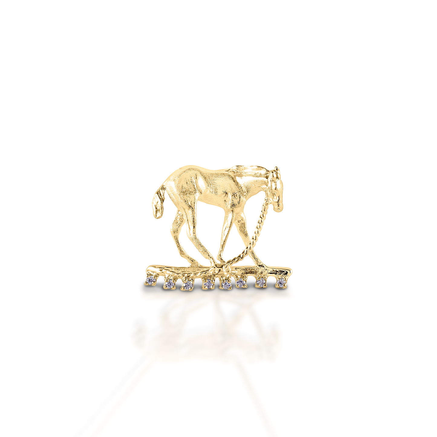 The Kelly Herd Foal & Halter Pendant perfectly captures a moment in the life of a foal, "what is this halter thing they have put on me?!" Beautifully crafted in 14K gold. Features Foal pendant Enhanced with diamonds Available in 14K gold 15 mm x 22mm