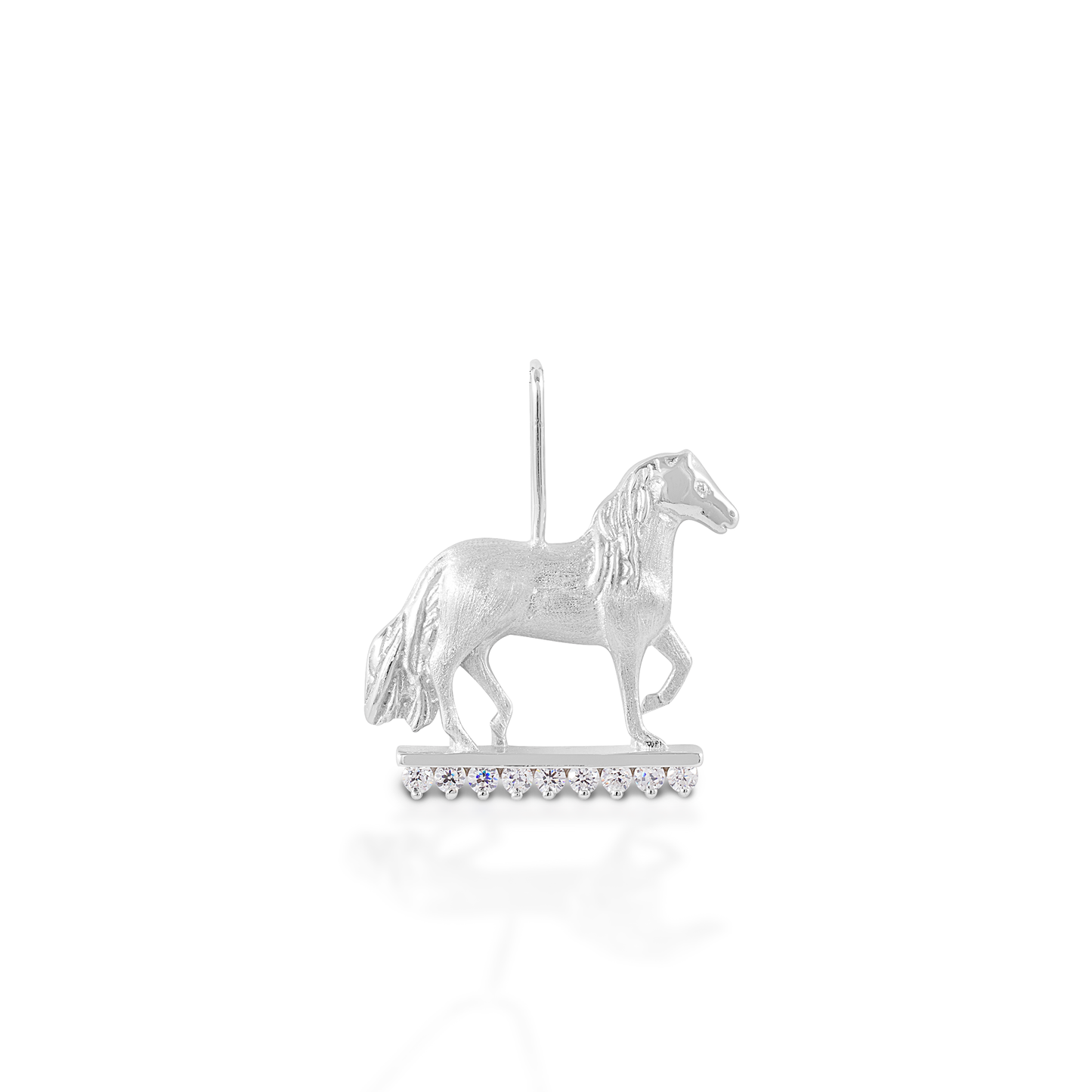 Fan of the smooth ride? Show your love of this unique breed with the Kelly Herd Paso Fino Pendant! This lovely piece is crafted in brushed 14K gold, with diamonds as the "ground." Features Paso Fino pendant Enhanced with diamonds Available in 14K gold