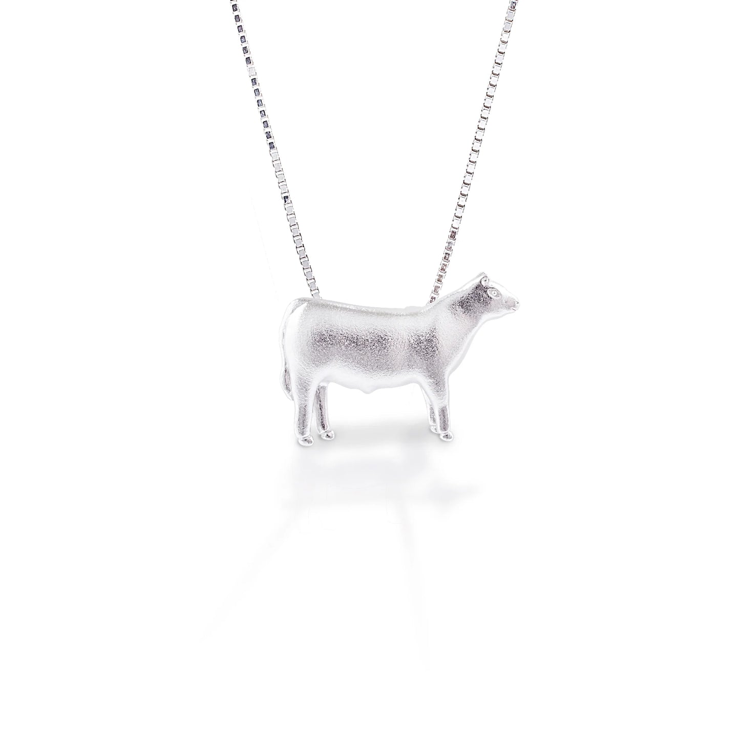 You're not just a cattle rancher, you're a true cowgirl, and you're going to show it by wearing this steer around your neck. It's detailed design makes this piece a great choice for any cattle lover! At home on the ranch or out in town, this steer will be there to remind you of where you came from. Features Beautifully Rendered Steer Pendant Brushed finish Measures 12 mm x 18 mm 16"-18" Adjustable Box Chain Sterling Silver
