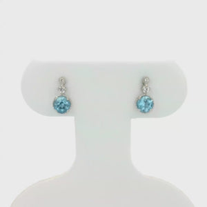 Kelly Herd Blue Topaz Three Stone Earrings - Sterling Silver