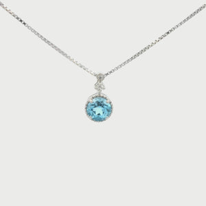 Kelly Herd Blue Topaz Three Stone Pendant - Sterling Silver