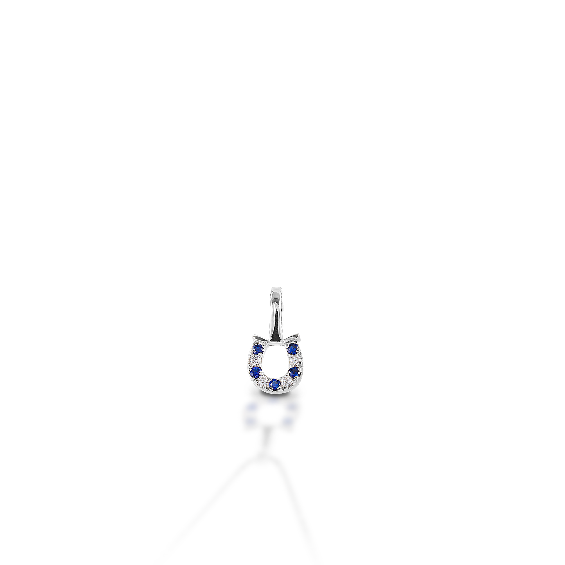 The Kelly Herd Blue & Clear Horseshoe Pendant features a delicate gold pendant enhanced with sapphires & diamonds set in a horseshoe. Perfect for taking a little luck into the ring with you!  Features      Delicate horseshoe pendant.     Sapphires & Diamonds     Available in 14K gold     8mm x 8mm