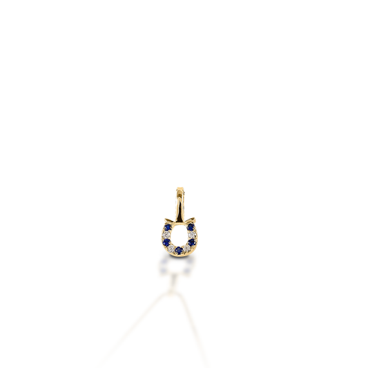 The Kelly Herd Blue & Clear Horseshoe Pendant features a delicate gold pendant enhanced with sapphires & diamonds set in a horseshoe. Perfect for taking a little luck into the ring with you!  Features      Delicate horseshoe pendant.     Sapphires & Diamonds     Available in 14K gold     8mm x 8mm