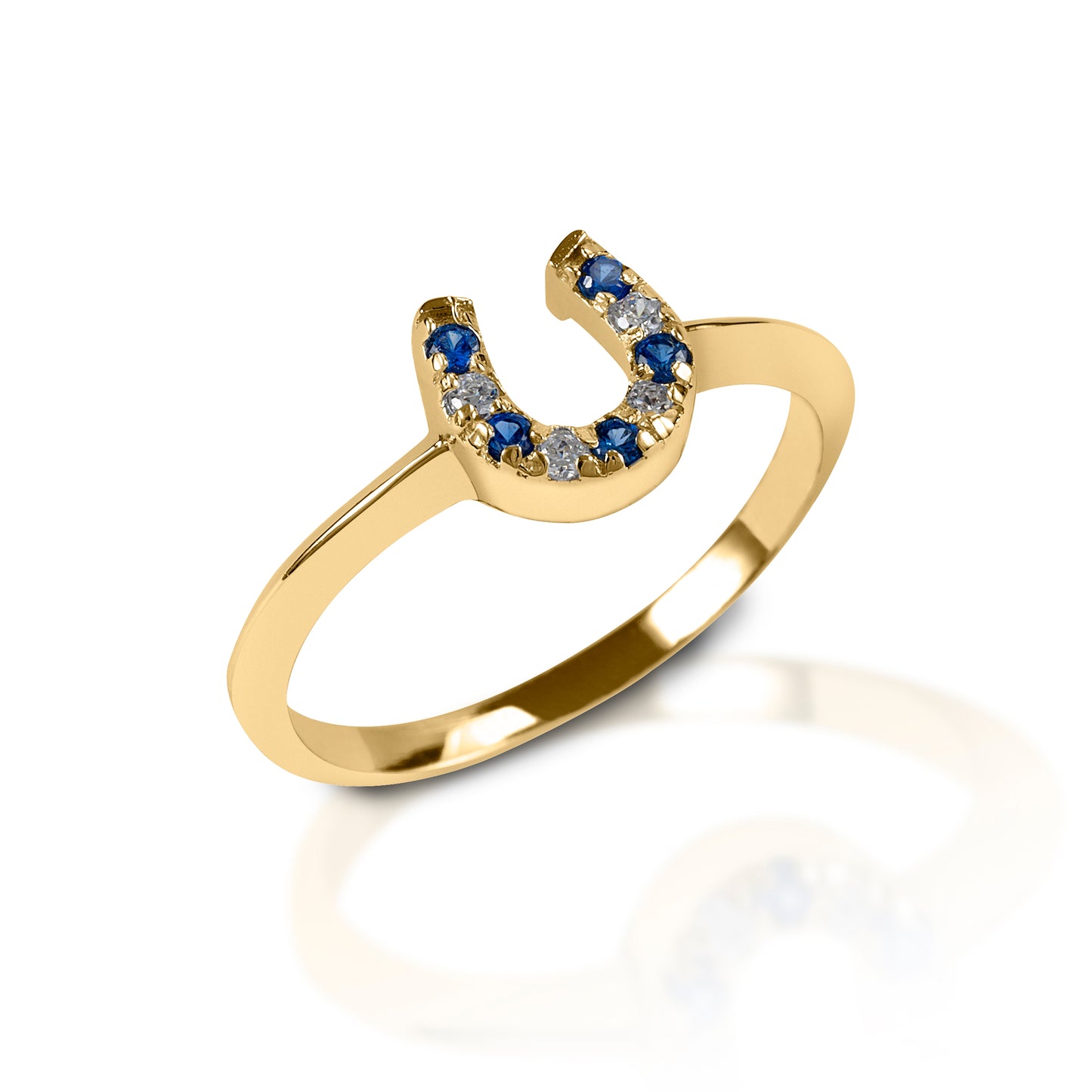 The Kelly Herd Blue & Clear Horseshoe Ring is a delicate sterling 14k yellow or white Gold ring enhanced with blue stones and diamonds set in a horseshoe. Perfect for taking a little luck into the ring with you!  Features      Delicate horseshoe ring     Sapphire and diamond gemstones     Available in white gold, or yellow gold     Matching earrings and necklace available     8mm wide