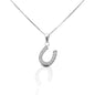 The Kelly Herd Large Clear Dangle Horseshoe Necklace features a beautiful offset sterling silver horseshoe design enhanced with clear cubic zirconia stones. This is the larger version of one of our best selling pendants. It's perfect for taking a little luck into the ring with you. Comes with a 16" - 18" adjustable box chain.  