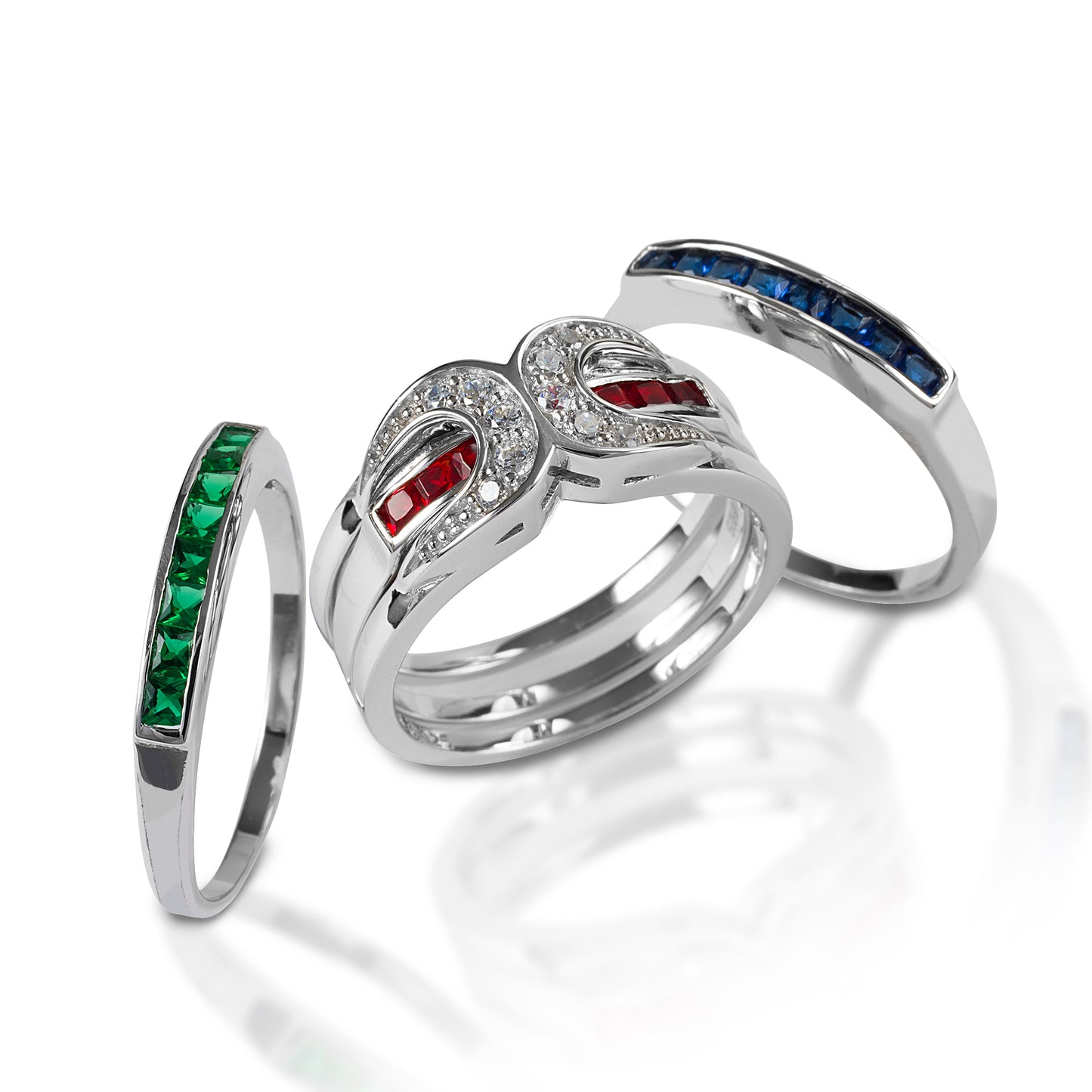     Horseshoe ring with interchangeable bands.     Comes with red, blue, and green cubic zirconia bands     Can be worn with the horseshoe frame, alone, or stacked     10mm wide
