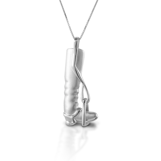 The Kelly Herd Tall Boot & Stirrup Necklace features the classic silhouette of a English tall boot; there is even a tiny spur strap! Made of sterling silver, with a satin finish, this necklace would make an ideal gift for any English rider. Comes with a 16"-18" adjustable chain.  Features      Finely detailed English tall boot and stirrup pendant     Satin finish     Sterling Silver     Adjustable 16-18" chain     44mm x 18mm