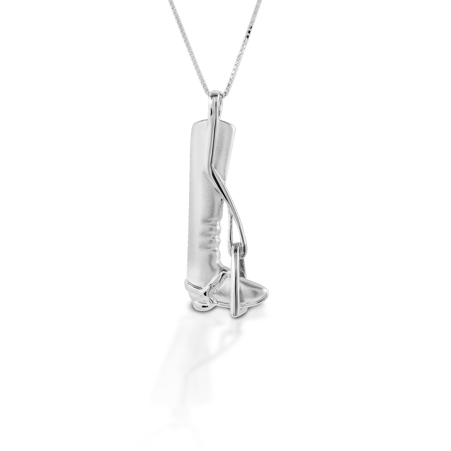 The Kelly Herd Tall Boot & Stirrup Necklace features the classic silhouette of a English tall boot; there is even a tiny spur strap! Made of sterling silver, this necklace would make an ideal gift for any English rider. Comes with a 16"-18" adjustable chain.  Features      Finely detailed English tall boot and stirrup pendant     Satin finish     Sterling Silver     Adjustable 16-18" chain     36mm x 14mm