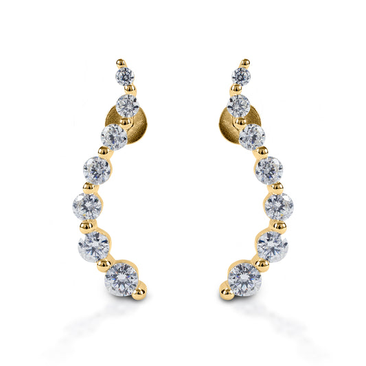     Elegant "journey" style earrings     White or yellow gold available with various grades of diamonds (call for pricing)     Stud backs     23mm x 4mm