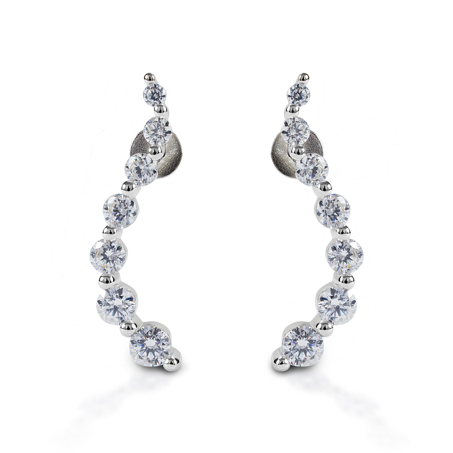 Kelly Herd Journey Earrings will be an elegant addition to your jewelry wardrobe. These stud earrings feature a curved line of graduated sized stones. Sterling silver with clear cubic zirconia stones. These earrings would make a perfect anniversary or graduation gift for a special someone!  Features      Elegant "journey" style earrings     Sterling silver with clear cubic zirconia stones     Stud backs     23mm x 4mm