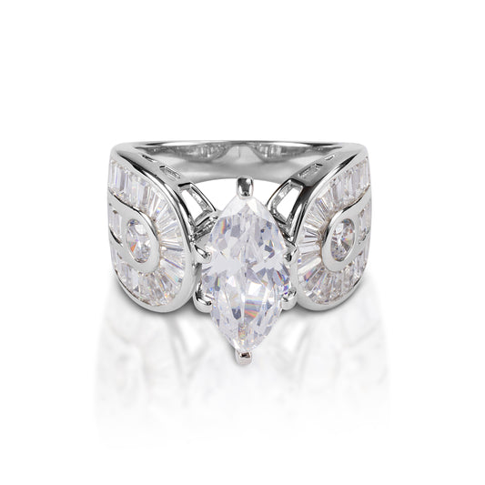     Statement ring with equestrian theme     White or yellow gold with single clear marquise cut diamond     Double horseshoes with pavé set diamonds     12mm wide