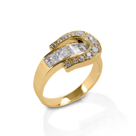 Go West! The Kelly Herd Western Buckle Ring is a bright and eye-catching stylized Western Belt Buckle. It's made of white or yellow gold, with square diamonds on the "belt" and round diamonds on the "buckle."  Features      Western buckle ring     Square and Round diamonds     White or yellow gold     13mm wide