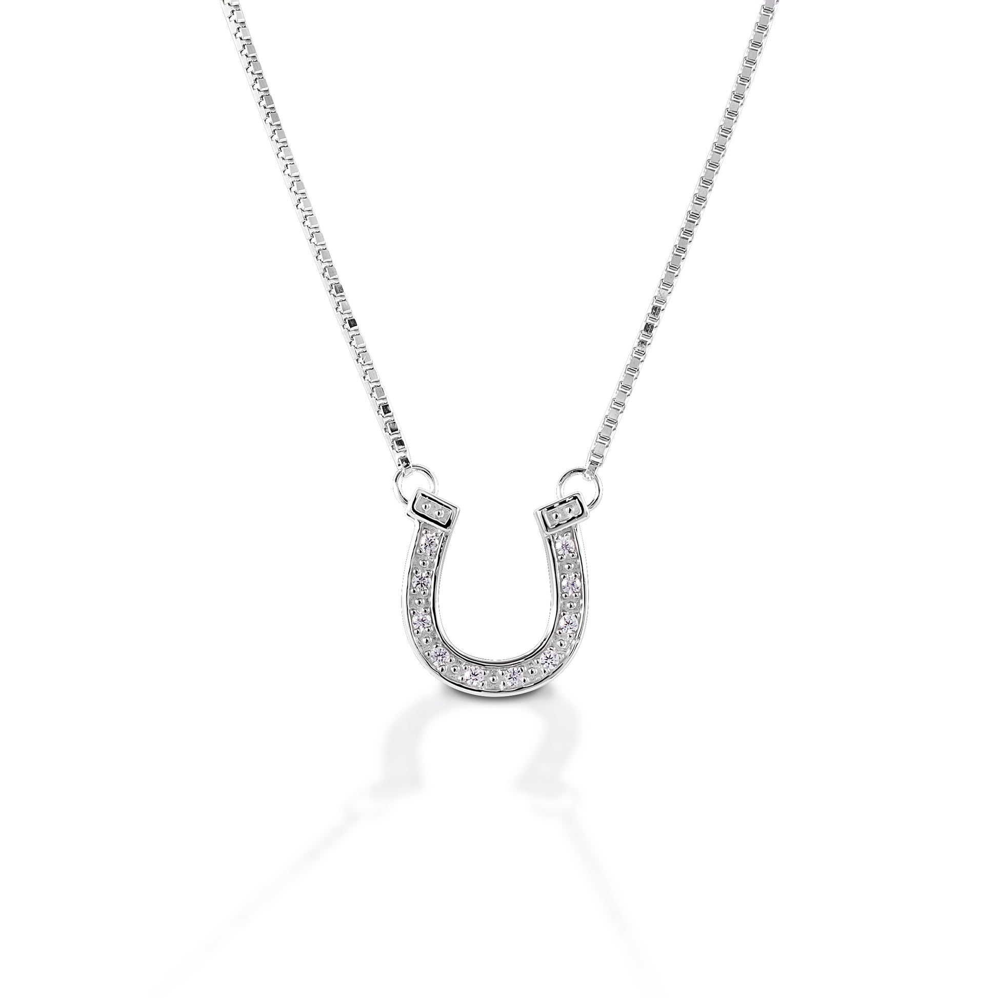 The Kelly Herd Pavé Horseshoe Necklace features an authentically detailed horseshoe pendant (it even has heel caulks!). The groove of the shoe is enhanced with pavé cubic zirconia stones. Sterling Silver. Comes with attached, adjustable 16-18" chain.  Features      Horseshoe pendant     Pavé cubic zirconia stones     Sterling Silver     Adjustable 16-18" chain     15mm x 16mm
