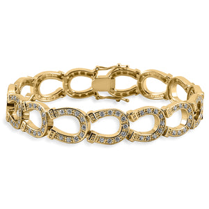Forget about a tennis bracelet, an equestrian bracelet is much better! The Kelly Herd Horseshoe Bracelet is made of heel to toe linked horseshoes, all enhanced with diamonds. Available in your choice of white or yellow gold.  Features      Horseshoe chain bracelet     Available in white gold, or yellow gold     Diamonds     12mm wide x 71/4''