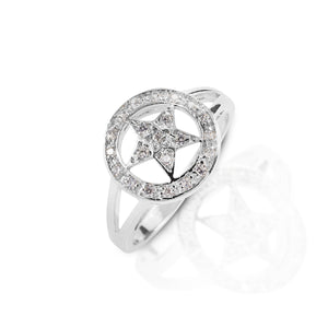 Show the world you're a star! The Kelly Herd Small Star Ring features a pave set cubic zirconia star in a circle. Crafted out of sterling silver, the open branching on the band keep this ring from looking bulky. A great gift idea for the star in your life!  Features      Western star themed ring     Clear cubic zirconia stones     Sterling Silver     Matching earrings, necklace, and bracelet available     13mm wide   