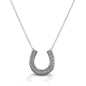 With the Kelly Herd Contemporary Pavé Horseshoe Necklace, you can carry your lucky charm with you always! This clean lined horseshoe pendant features diamonds set in 14K gold. Of course, the horseshoe opens up so the luck doesn't fall out!  Features      Horseshoe pendant necklace     Diamonds     Available in 14K gold     16mm x 14mm