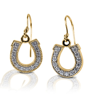 Kelly Herd Dangle Horseshoe Earrings feature horseshoe shaped drops on a hook style posts. Made in your choice of white or yellow gold with diamonds.  Features      Horseshoe shaped earrings     Diamonds     Available in white gold, or yellow gold     Hook style posts     12mm x 16mm