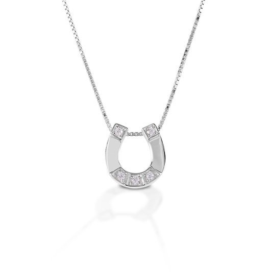 Crafted in sterling silver, the Kelly Herd Large Horseshoe Necklace features a wide plate horseshoe pendant with cubic zirconia toe and heel clips. Any horse lover will immediately appreciate this design! Comes with 16-18" adjustable chain.  Features      Horseshoe pendant     Enhanced with clear cubic zirconia stones     Sterling Silver     16-18" adjustable chain     12mm x 12mm