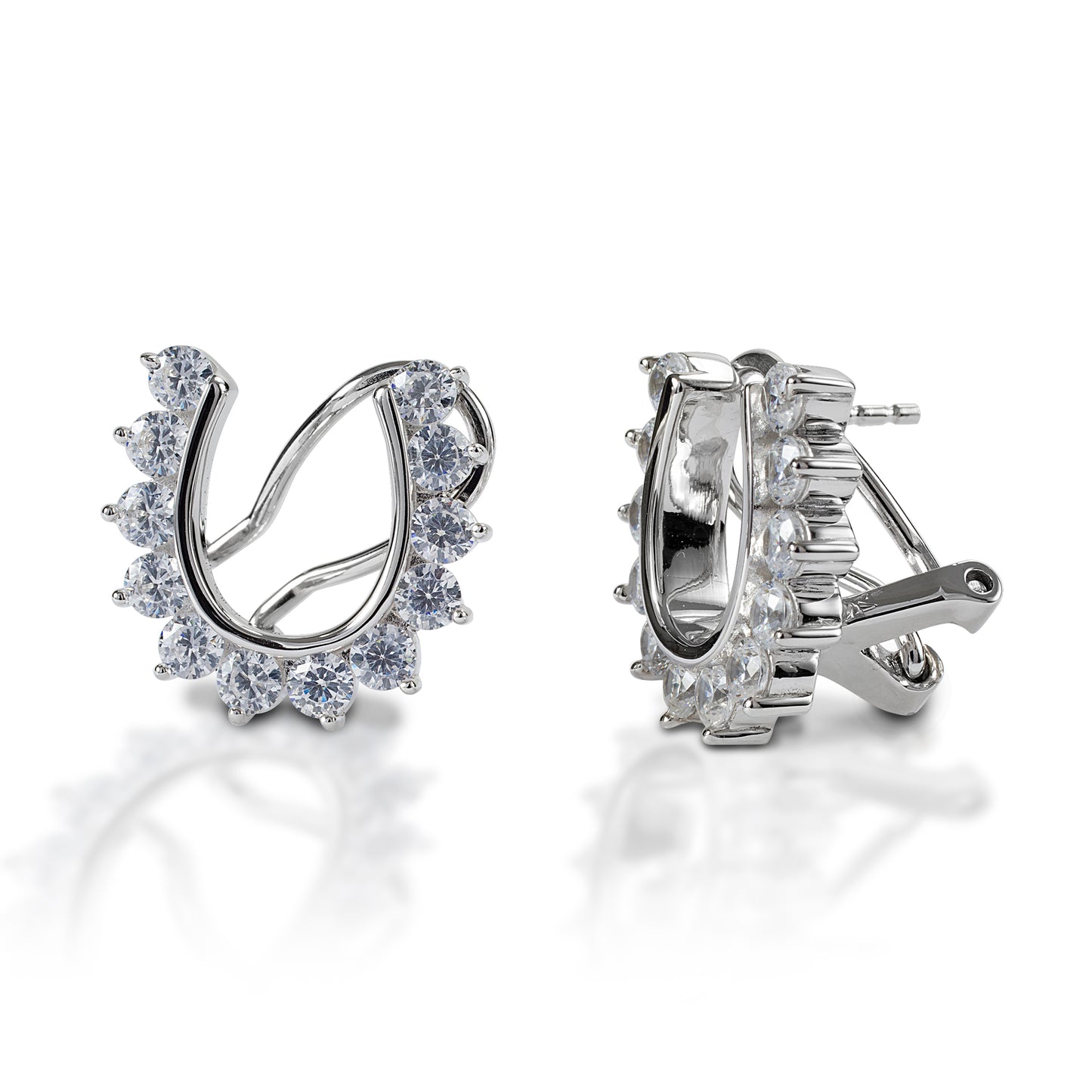 You wouldn't put these horseshoes on your horse, but they are awfully pretty! The Kelly Herd French Clip/Post Back Horseshoe Earrings have outside prong set diamonds on a horseshoe shape, creating a scalloped edge. Available in 14k yellow or white Gold.  Features      Horseshoe earrings     Diamonds     Available in white gold, or yellow gold     French clip back     12mm x 14mm