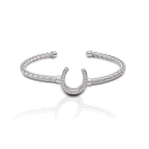     Traditional Horseshoe Design     Enhanced with Clear Cubic Zirconia Stones     Italian Weave Bracelet     12mm high x 12mm wide Horseshoe     Sterling Silver   