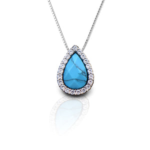     Western Teardrop Design     Lab Turquoise Stone Enhanced with Cubic Zirconia      Measures 19mm high x 13mm wide     16"-18" Adjustable Box Chain     Matching Earrings Available     Sterling Silver