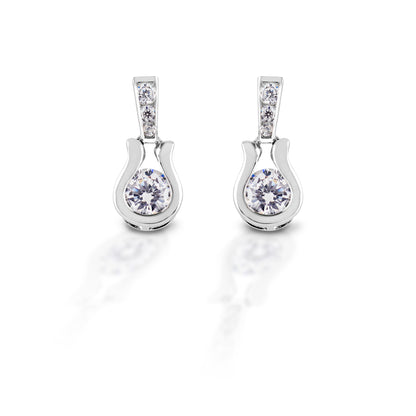 Are they horseshoes? Or perhaps Western stirrups? Or maybe just elegant scrolls. It really doesn't matter because the Kelly Herd Stylized Horseshoe Earrings are gorgeous! Made of smooth finish sterling silver, with clear cubic zirconia accents on top, and a single stone on the dangle, these earrings will go with anything.  Features      Stylized horseshoe shaped earrings     Cubic zirconia     Sterling Silver     Matching pendant available