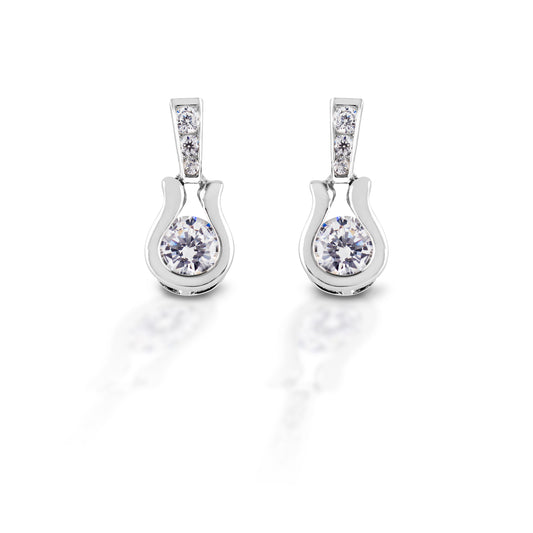 Are they horseshoes? Or perhaps Western stirrups? Or maybe just elegant scrolls. It really doesn't matter because the Kelly Herd Stylized Horseshoe Earrings are gorgeous! Made of smooth finish sterling silver, with clear cubic zirconia accents on top, and a single stone on the dangle, these earrings will go with anything.  Features      Stylized horseshoe shaped earrings     Cubic zirconia     Sterling Silver     Matching pendant available
