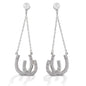 Kelly Herd Double Horseshoe Earrings are dramatic double horseshoe earrings enhanced with CZ. The horseshoes hang on chains from post backs, giving them movement and the ability to catch the light. Sterling Silver. Matching necklace is available.  Features      Dangle earrings with double horseshoes     Clear cubic zirconia stones     Sterling Silver     Post backs     11mm x 38mm