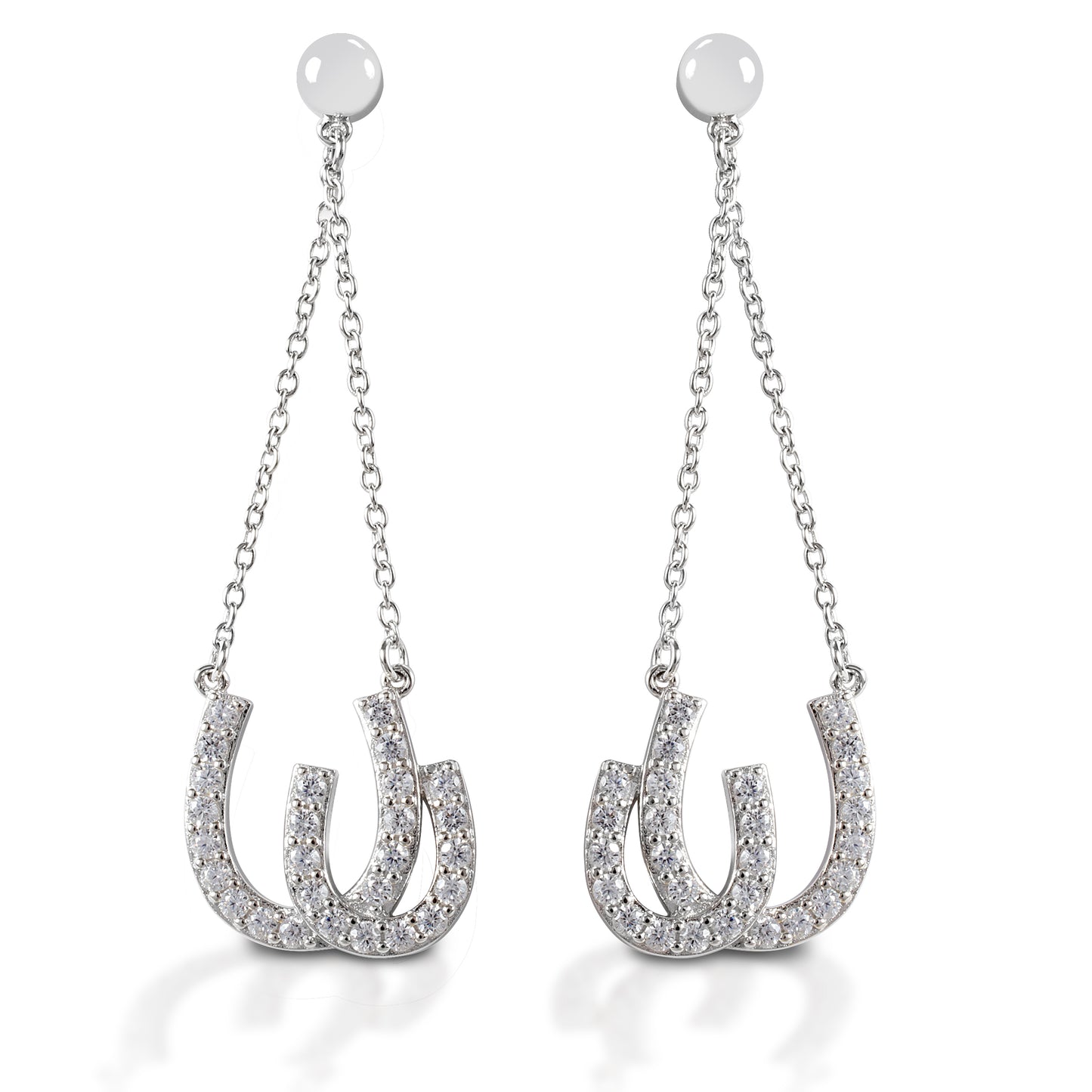 Kelly Herd Double Horseshoe Earrings are dramatic double horseshoe earrings enhanced with diamonds. The horseshoes hang on chains from post backs, giving them movement and the ability to catch the light. Available in your choice of white, or yellow 14k gold. Matching necklace is available.  Features      Dangle earrings with double horseshoes     Diamonds     Available in white gold, or yellow gold     Post backs     11mm x 38mm