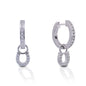 The Kelly Herd Hanging Horseshoe Earrings are the ultimate way to show your love for the equine world. Our Hanging Horseshoe Earrings feature a huggie style post with a hoop channel set earring. Perfect for everyday. The horseshoes will bring you and your horse good luck!  Features      Hanging Horseshoe Design      Enhanced with Clear Cubic Zirconia Stones     Huggie Style Closure      Sterling Silver     Measures 25 mm x 8 mm