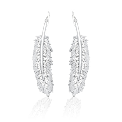 The Kelly Herd Shimmering Feather Dangle Earrings have a charming natural appeal. They are a must have for anyone with a free spirited sense of style. The engraved details of the feathers are accented with brilliantly sparkling cubic zirconia stones. These pair perfectly with the Kelly Herd Shimmering Feather Pendant Necklace.    Features      Detailed Feather Design     Enhanced with Clear Cubic Zirconia Stones     Dangle Hook Style     Sterling Silver     Measures 30mm high and 8mm wide