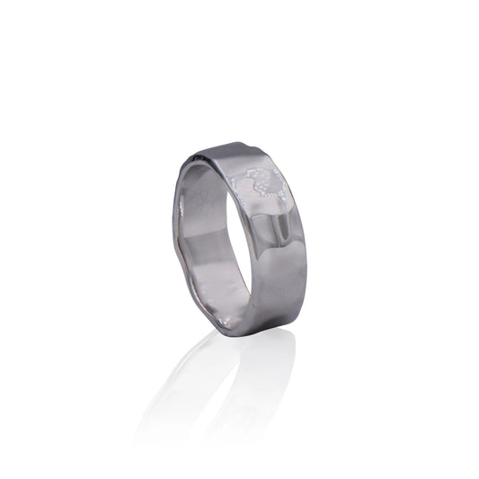 Bringing back the 1970's, this boldly styled ring is made of sterling silver with a hammered texture.  Its simple and elegant design adds a touch of retro cool to any look and makes this ring perfect for both casual or formal wear. This ring is a future heirloom that you can pass down for generations to come.  Features      Hammered Design      Sterling Silver      Comfortable Weight      5 mm wide