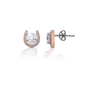     Horseshoe Stud Design     14K Rose Gold Plated Horseshoe     Enhanced with Clear Cubic Zirconia Stones     Measures 10mm high and 10mm wide     Post Back     Sterling Silver