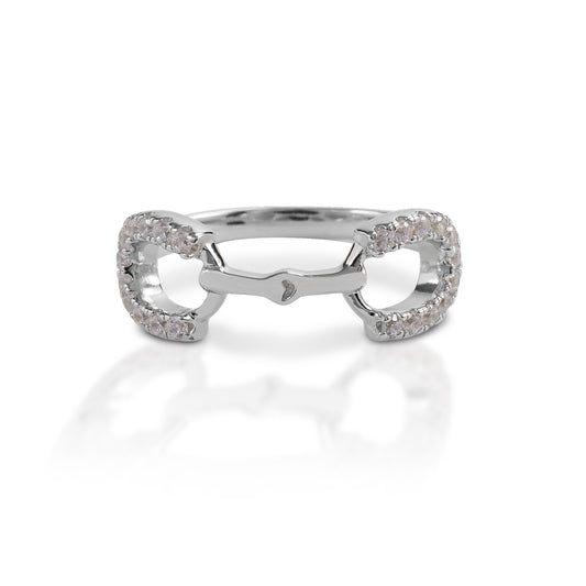 The Kelly Herd Clear Stone Horseshoe Bit Ring is made of sterling silver featuring a snaffle bit design with clear CZ enhanced horseshoes as the bit rings.  Features      English snaffle style ring     Enhanced with clear CZ stones     9mm wide