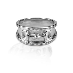 Perfect for the equestrian that prefers a ring without any bling! The Kelly Herd Wide Band D Ring Bit features a 9mm wide band of brushed sterling silver with a raised beaded edge.  In the center sits a perfectly formed tiny D ring bit.   Features      Wide brushed band     Raised beaded edge     Sterling silver     Raised dee ring bit relief