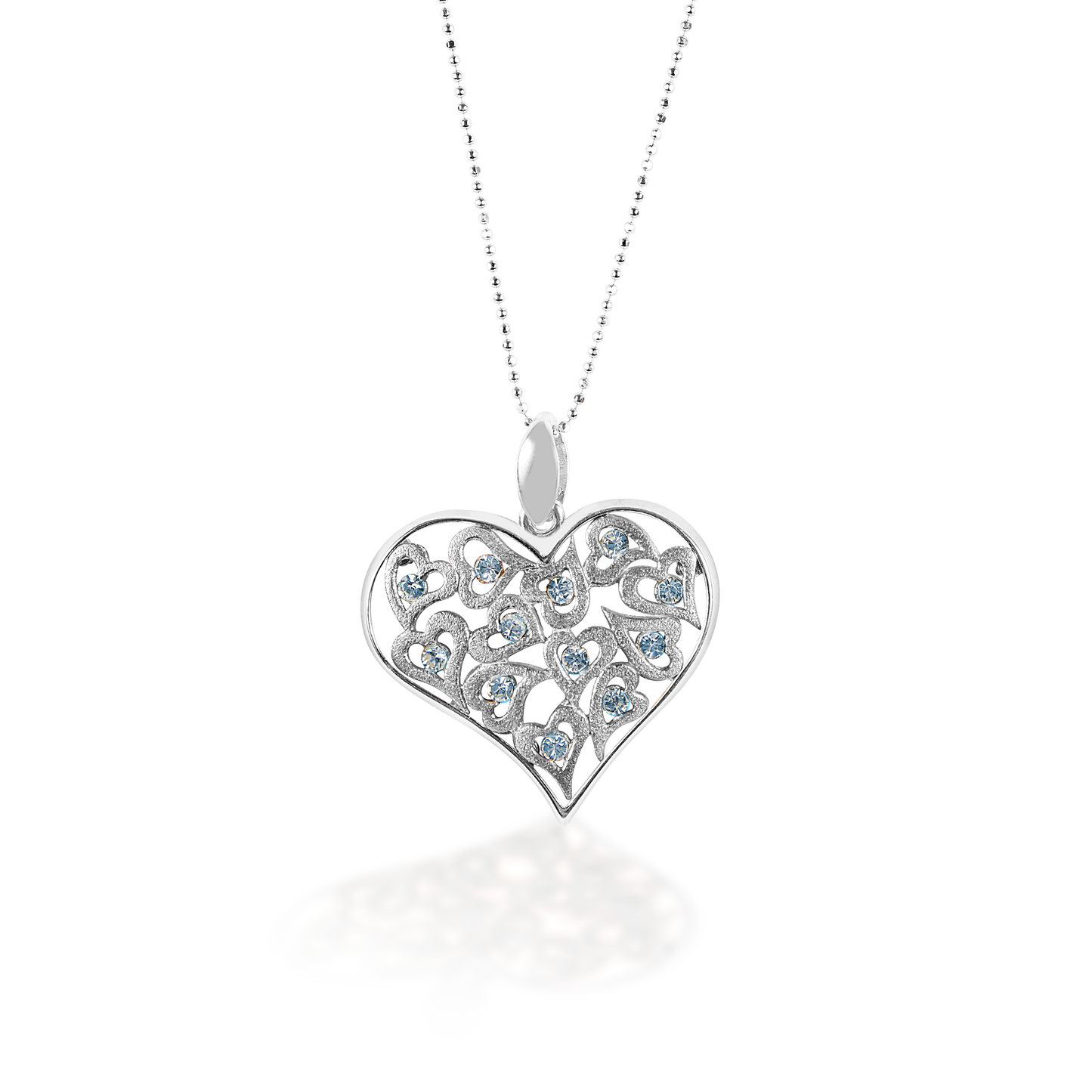 The Kelly Herd Clear Multi-Heart Pendant features a large free form sterling silver heart surrounding multiple small hearts with clear cubic zirconia stones. Comes complete with adjustable chain.   Features:      Heart shaped pendant     Sterling silver     Smaller hearts within the large heart     Clear cubic zirconia stones     Complete with adjustable chain