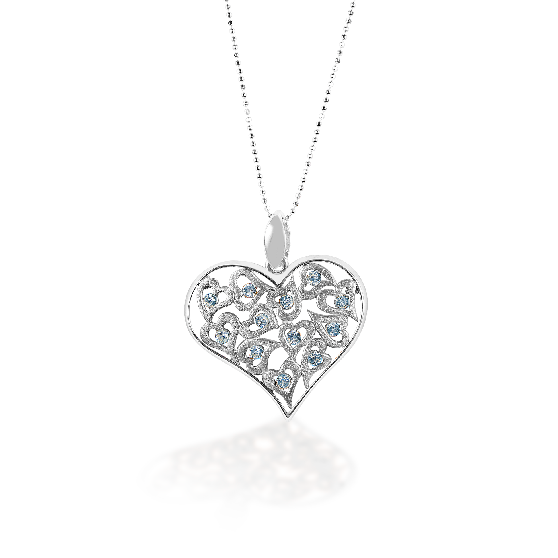 The Kelly Herd Clear Multi-Heart Pendant features a large free form sterling silver heart surrounding multiple small hearts with clear cubic zirconia stones. Comes complete with adjustable chain.   Features:      Heart shaped pendant     Sterling silver     Smaller hearts within the large heart     Clear cubic zirconia stones     Complete with adjustable chain