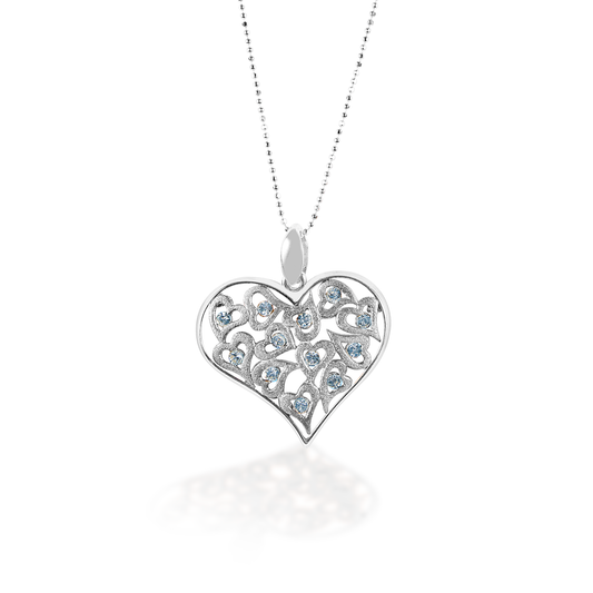 The Kelly Herd Clear Multi-Heart Pendant features a large free form sterling silver heart surrounding multiple small hearts with clear cubic zirconia stones. Comes complete with adjustable chain.   Features:      Heart shaped pendant     Sterling silver     Smaller hearts within the large heart     Clear cubic zirconia stones     Complete with adjustable chain