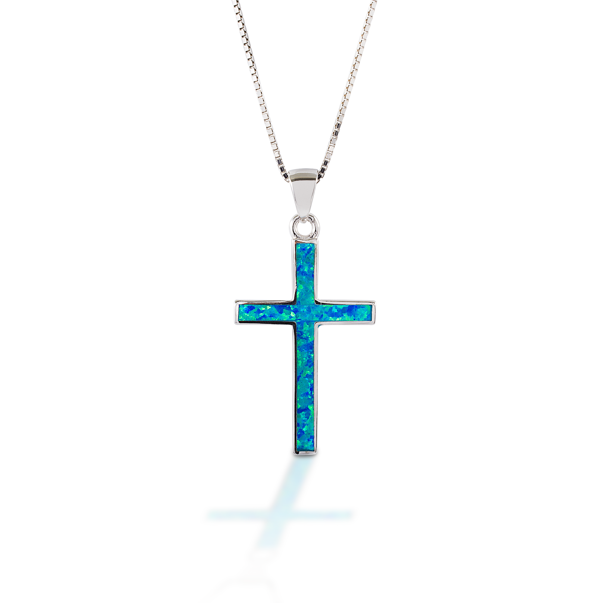 Sometimes simple is better! The Kelly Herd Blue Opal Cross Necklace has a clean lined cross pendant inlaid with blue opal. Light, bright, and lovely!  Features      Cross pendant     Sterling silver     Inlaid with opal     Adjustable 16-18"     32mm x 18mm