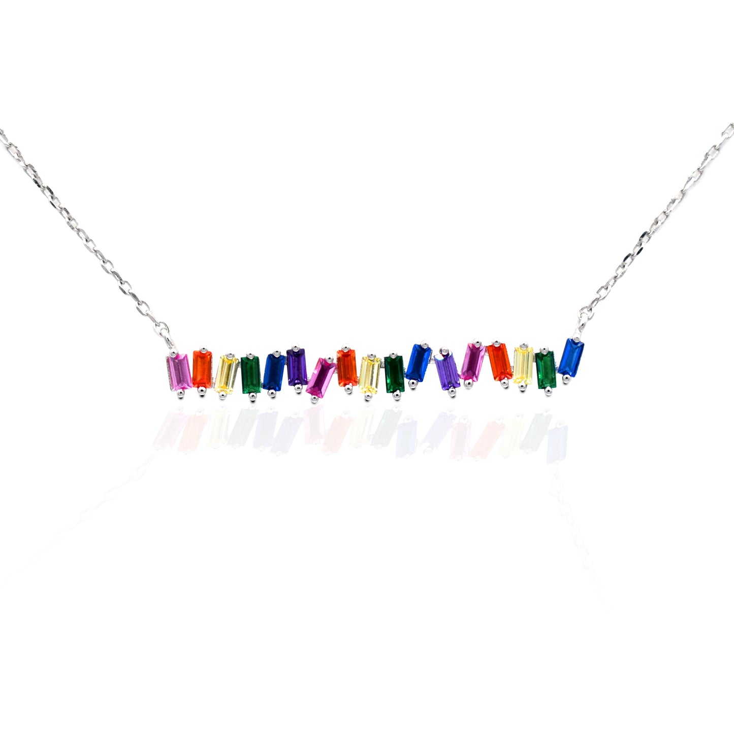 The Kelly Herd Multi-Color Bar Necklace is a must have for any jewelry collection. The baguette cut rainbow colored cubic zirconia stones are set in sterling silver featuring a 16"-18" adjustable chain, making this perfect for an easy layered style.   Features      Multi-Color baguette cut Cubic Zirconia stones     Lobster Clasp     Available in Sterling Silver
