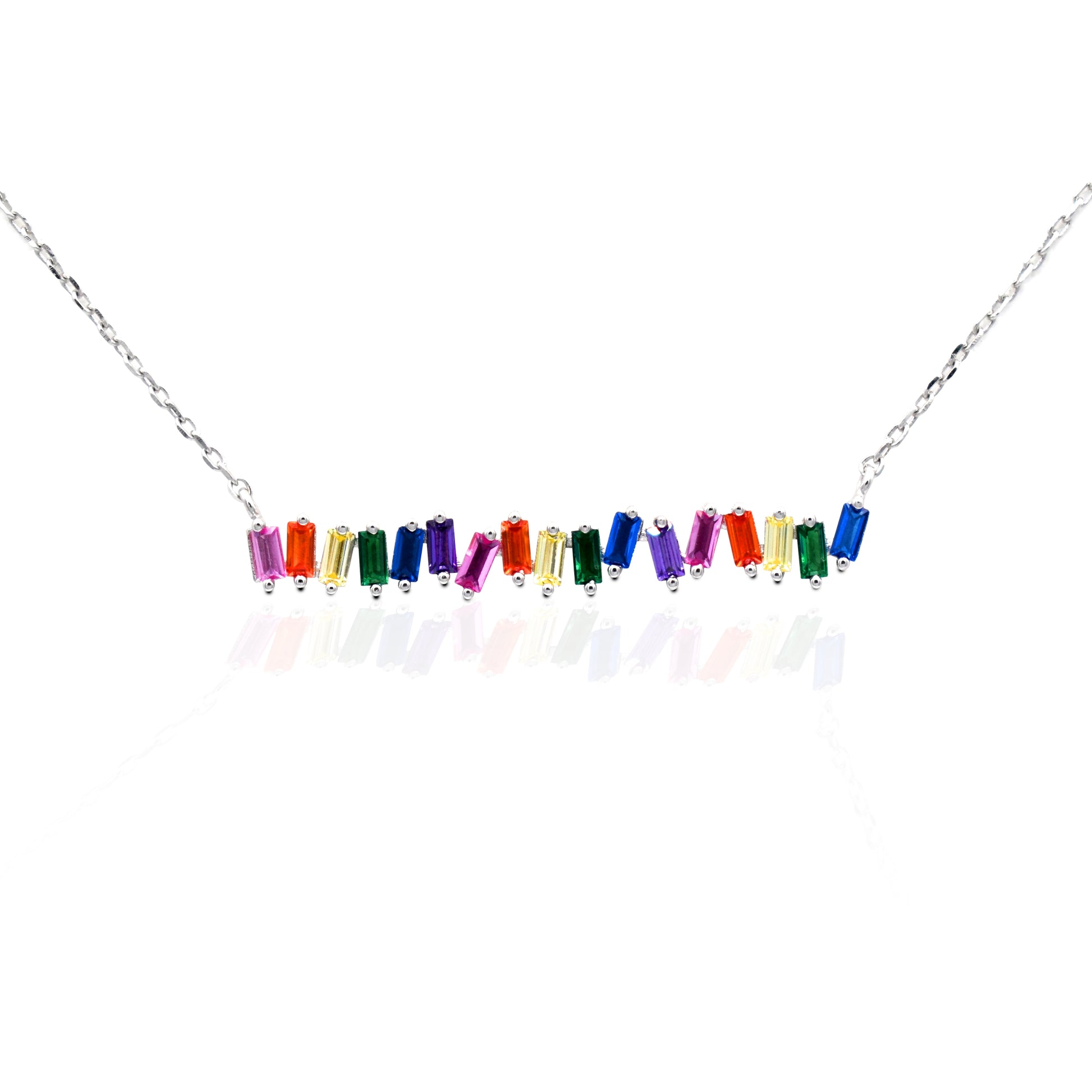 The Kelly Herd Multi-Color Bar Necklace is a must have for any jewelry collection. The baguette cut rainbow colored cubic zirconia stones are set in sterling silver featuring a 16"-18" adjustable chain, making this perfect for an easy layered style.   Features      Multi-Color baguette cut Cubic Zirconia stones     Lobster Clasp     Available in Sterling Silver
