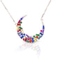 The Kelly Herd Multi-Color Crescent Necklace is simply stunning. The baguette cut rainbow colored cubic zirconia stones are set in a sterling silver crescent moon shape. This necklace features a 16"-18" adjustable chain, making this perfect for any outfit.  Features      Multi-Color baguette cut Cubic Zirconia stones     Crescent Moon setting     Lobster Clasp     Available in Sterling Silver