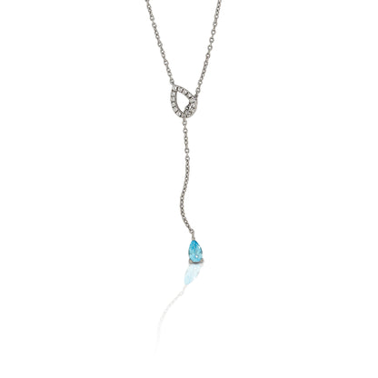 An ode to the Southwest, the Kelly Herd Blue Topaz Fixed Lariat Necklace is crafted in stunning sterling silver.  Reminiscent of a cowboy's lasso the hondo is accented with clear cubic zirconia stones and the tail is finished with a teardrop cut sky blue topaz stone. This piece is a delicate reminder of your passion for equestrian style. The necklace is a perfect compliment to the Kelly Herd Blue Topaz Fixed Lariat Earrings.