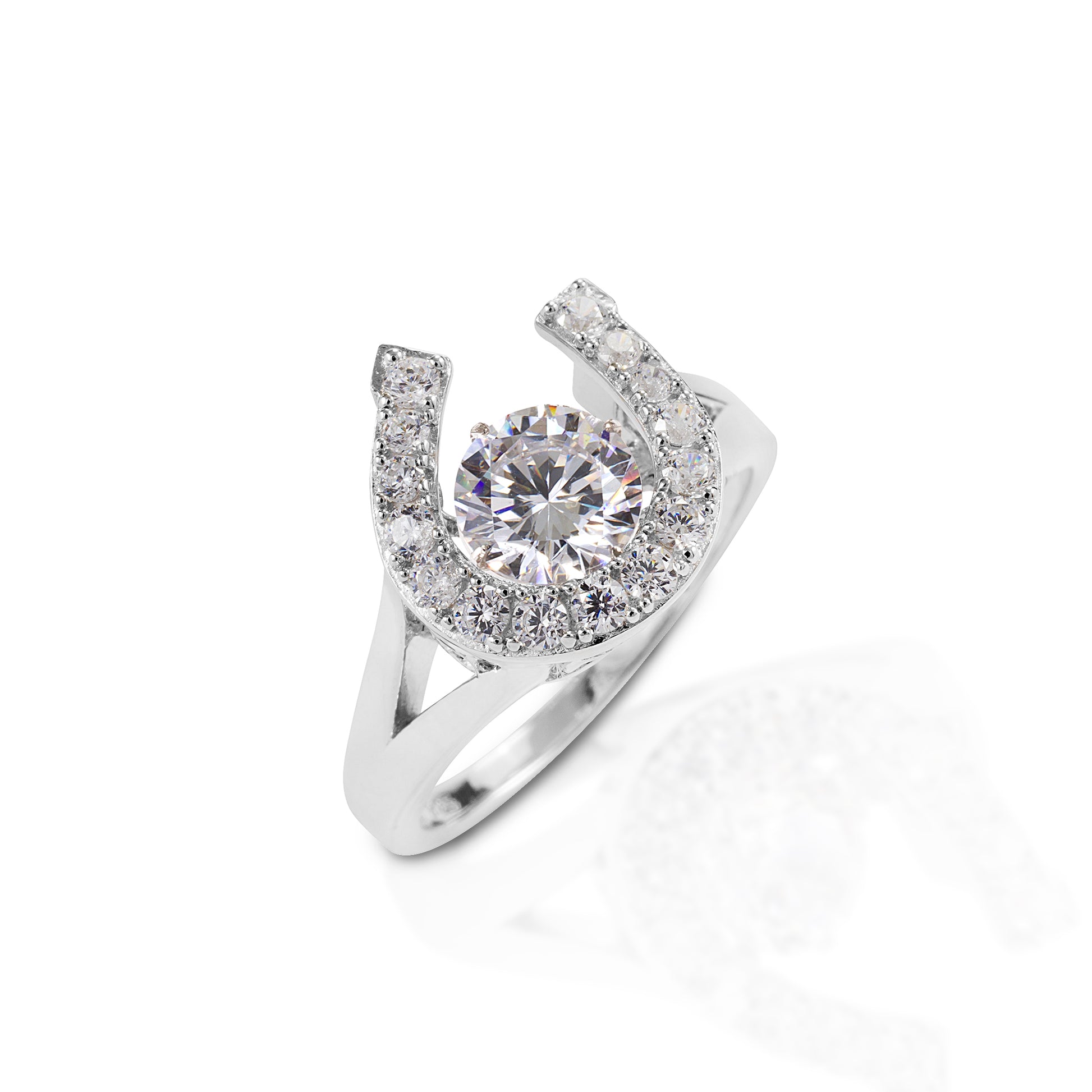 The Kelly Herd Dancing Stone Horseshoe Ring will sparkle with your every move. This sterling silver and clear CZ ring is all about movement and light. The center round CZ stone turns to add a three-dimensional element. Matching necklace and earrings are available.  Features      Horseshoe ring     "Dancing" CZ solitaire     Made of sterling silver     24mm wide