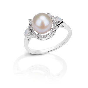 Elegant and unique this Kelly Herd Pearl Horseshoe Ring embodies subtle elegance. The 8mm center pearl is enhanced with 22 cubic zirconia stones set in a horseshoe and complimented with synthetic opals. This would make a wonderful gift for the modern chic equestrian in your life.   Features      8mm Pearl     2mm x 2mm .08CT Synthetic Opal     Sterling Silver     22 Clear Cubic Zirconia
