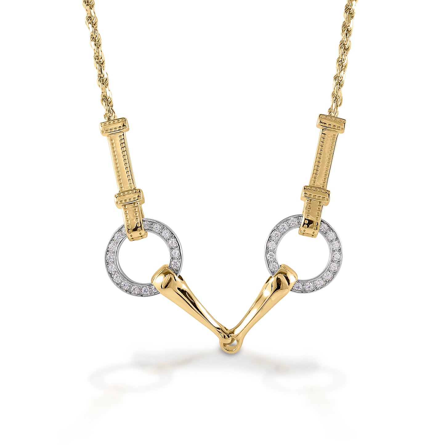 The Kelly Herd Snaffle Bit Necklace is impeccably designed. You can even see the tiny stitches on the "leather" that connects the bits. Made in 14K gold, enhanced with diamonds.  Features      Snaffle bit pendant     Enhanced with diamonds     Detailed check pieces connected it to the chain     Available in 14k gold